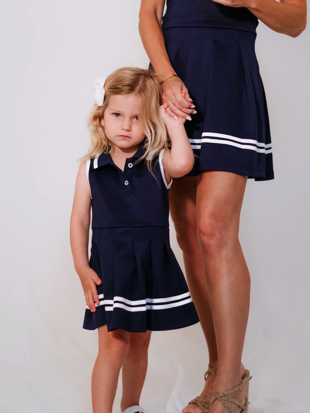 Girls Navy Pleated Tennis Skirt with White Stripe
